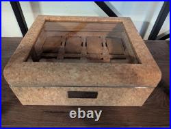 Analog/Shift 1976 Collection 8 Piece Watch Box features cork, steel trimming, an